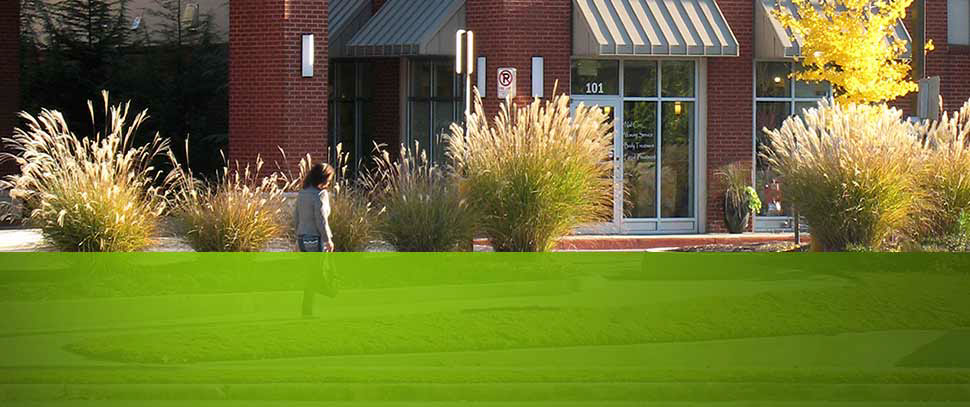 Street-level view of landscape architecture of CVS Powers Ferry mixed-use development.